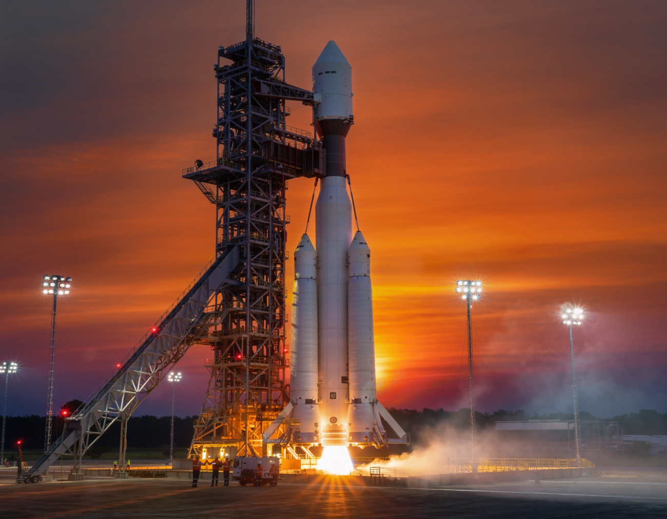 giant rocket on launch pad sunset testing