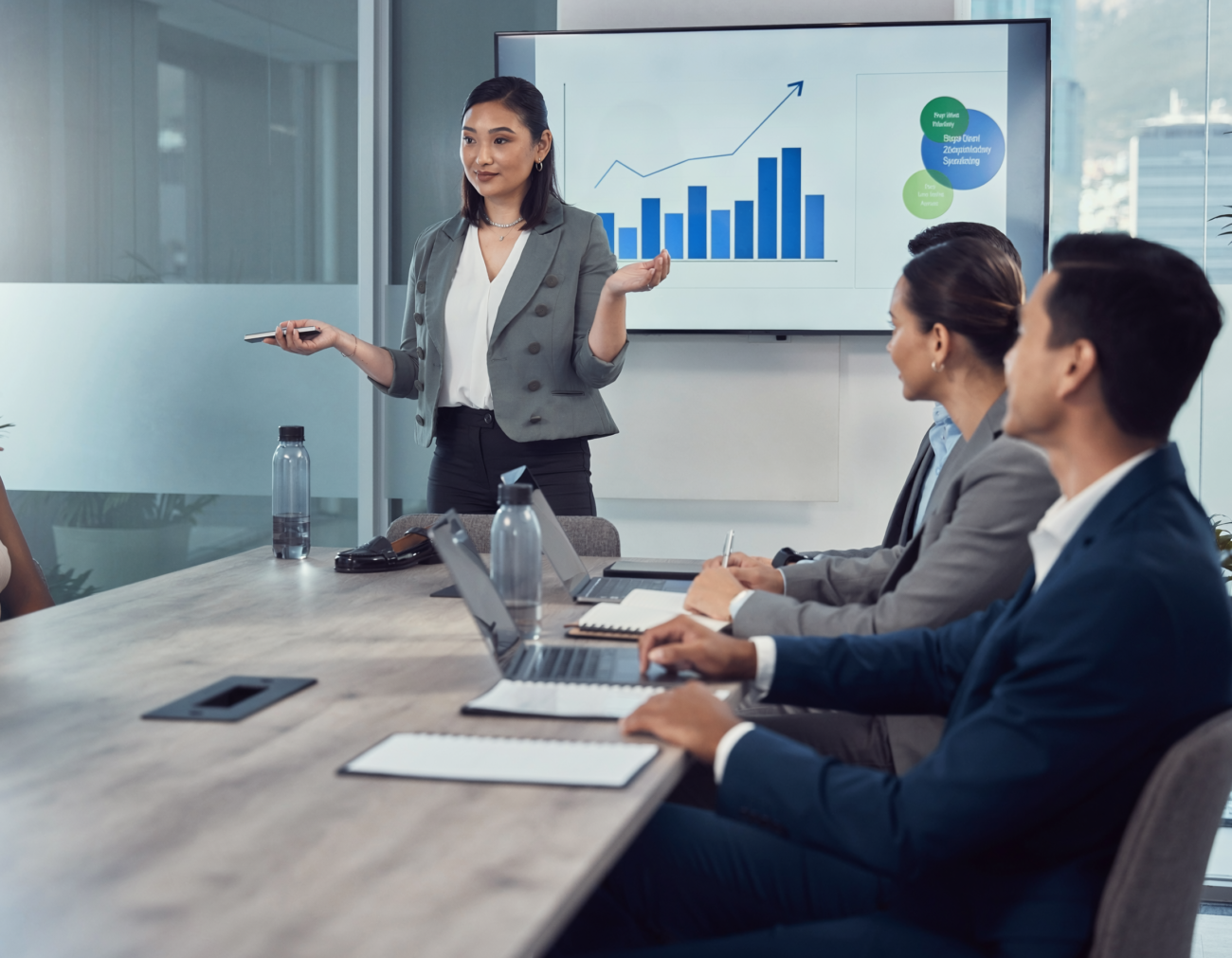 startup founder presenting to investors, confident but serious tone, business meeting room